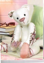 Rosie the Ballerina Bear beautifully decorated By Margaret Timmins having Adapted a pattern by Judy Gray.